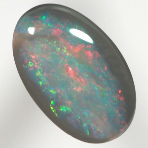 SOLID BLACK OPAL Bright blood red over greens